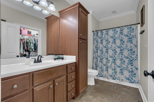 bathroom featuring ornamental molding, toilet, a shower with shower curtain, and vanity