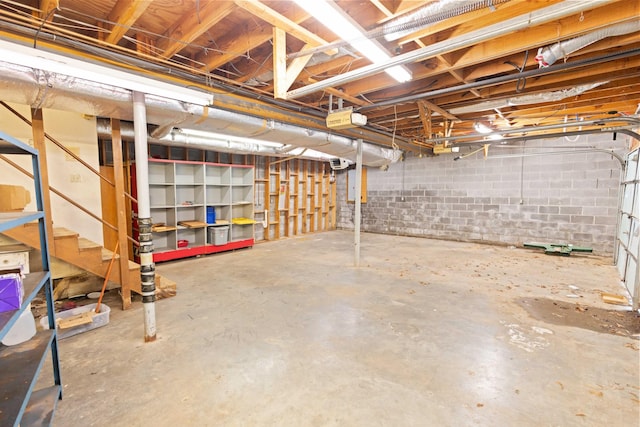 unfinished basement featuring stairs