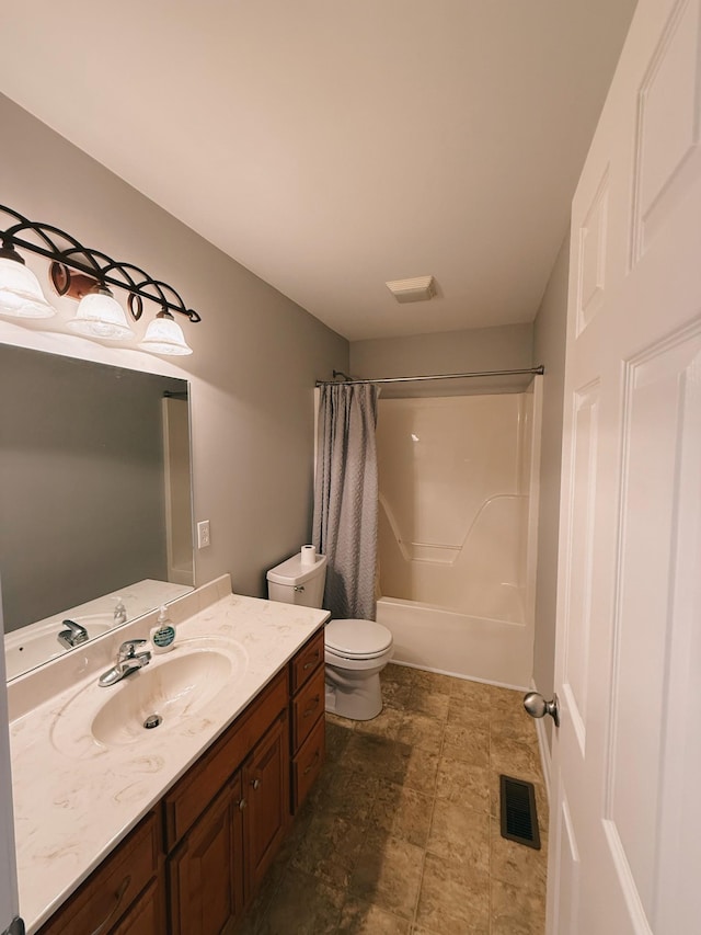 996 Iron Hill Rd, Burns, TN 37029 - full bath featuring visible vents, toilet, vanity, and shower / bath combo
