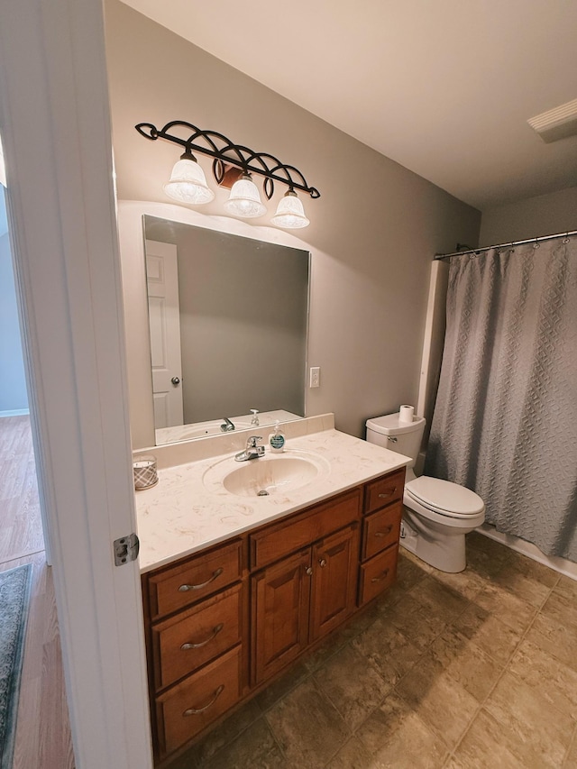 996 Iron Hill Rd, Burns, TN 37029 - full bathroom with toilet, a shower with shower curtain, and vanity