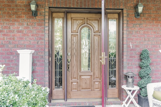 996 Iron Hill Rd, Burns, TN 37029 - doorway to property with brick siding