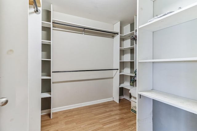 996 Iron Hill Rd, Burns, TN 37029 - spacious closet featuring light wood-type flooring