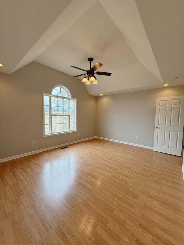 996 Iron Hill Rd, Burns, TN 37029 - unfurnished room with lofted ceiling, baseboards, light wood finished floors, visible vents, and a ceiling fan
