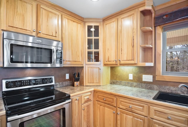 12112 Paw Paw Springs Rd, Arrington, TN 37014 - kitchen with open shelves, a sink, light brown cabinets, appliances with stainless steel finishes, and glass insert cabinets