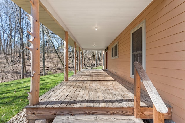 12112 Paw Paw Springs Rd, Arrington, TN 37014 - wooden deck featuring a lawn and covered porch