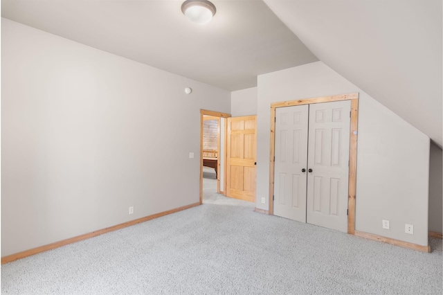 12112 Paw Paw Springs Rd, Arrington, TN 37014 - unfurnished bedroom with a closet, carpet, lofted ceiling, and baseboards