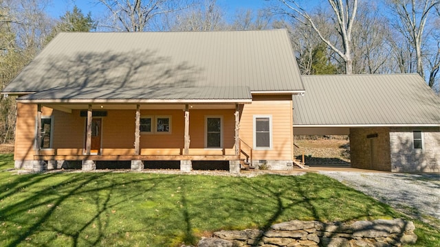 12112 Paw Paw Springs Rd, Arrington, TN 37014 - view of front of home featuring covered porch, an attached carport, metal roof, and a front lawn
