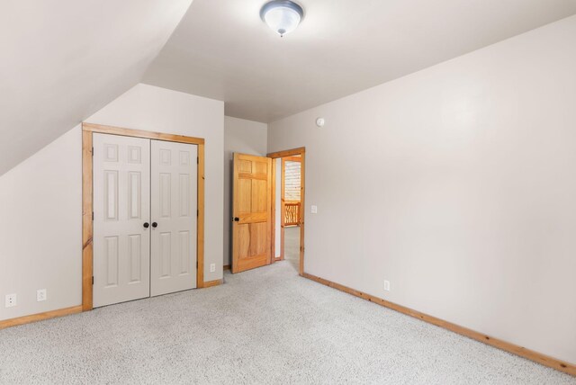 12112 Paw Paw Springs Rd, Arrington, TN 37014 - unfurnished bedroom with baseboards, lofted ceiling, a closet, and carpet flooring