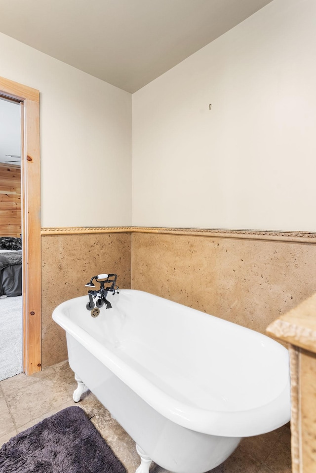 12112 Paw Paw Springs Rd, Arrington, TN 37014 - full bathroom with a wainscoted wall and a freestanding tub