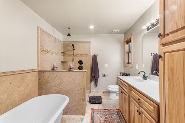 12112 Paw Paw Springs Rd, Arrington, TN 37014 - full bathroom featuring vanity, toilet, a soaking tub, visible vents, and a walk in shower