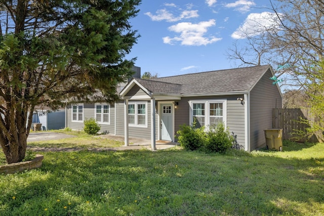 view of front of home with roof with shingles
