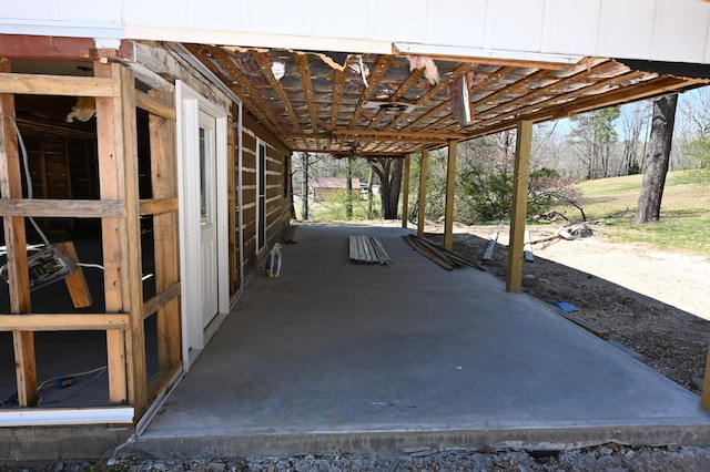 70 Old Bruceton Rd, Bruceton, TN 38317 - view of patio featuring an outbuilding and an exterior structure