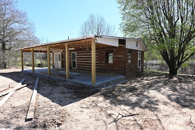 70 Old Bruceton Rd, Bruceton, TN 38317 - exterior space with a patio and fence