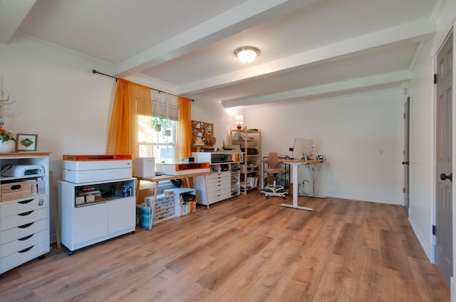 office space featuring ornamental molding, beamed ceiling, and wood finished floors