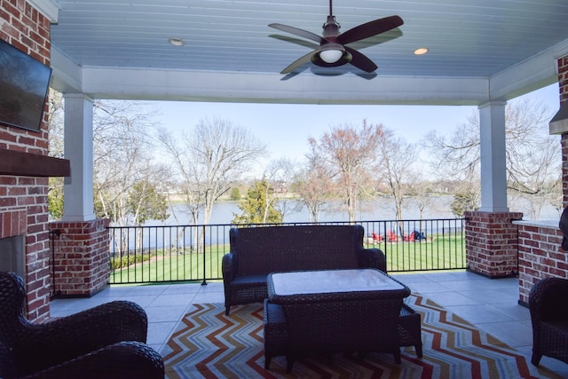 1395 Rozella Way, Gallatin, TN 37066 - view of patio featuring a water view, ceiling fan, and fence
