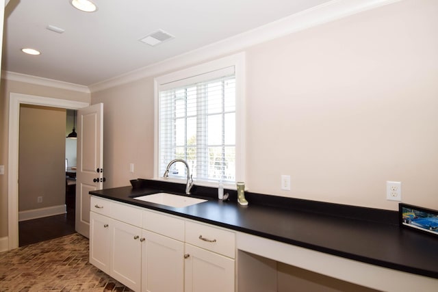 1395 Rozella Way, Gallatin, TN 37066 - kitchen featuring dark countertops, crown molding, a sink, and brick floor