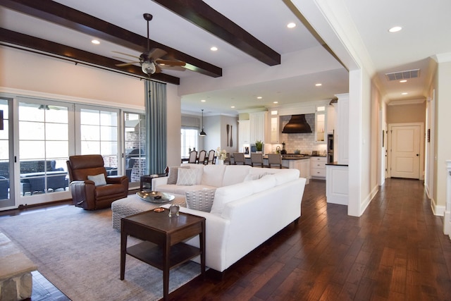 1395 Rozella Way, Gallatin, TN 37066 - living area featuring a ceiling fan, beam ceiling, crown molding, and visible vents