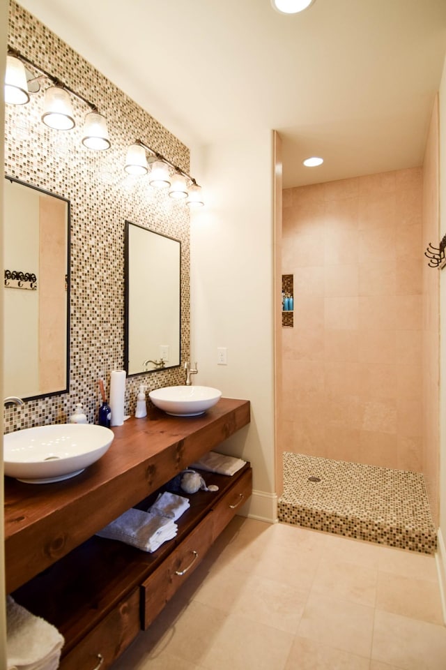 1395 Rozella Way, Gallatin, TN 37066 - full bath featuring double vanity, a sink, a tile shower, and backsplash