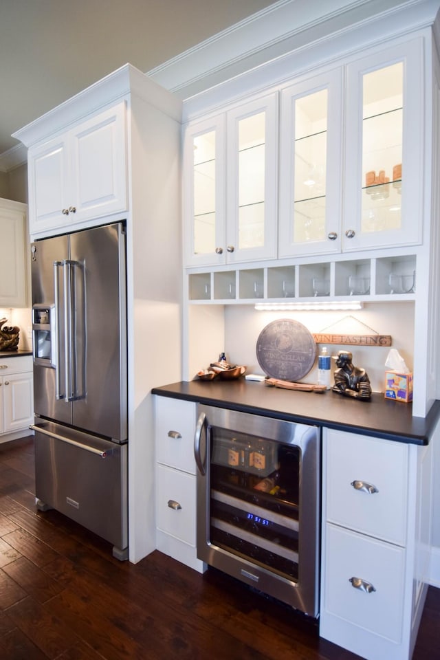 1395 Rozella Way, Gallatin, TN 37066 - kitchen featuring white cabinets, wine cooler, high end fridge, dark countertops, and dark wood-type flooring