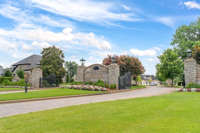 1395 Rozella Way, Gallatin, TN 37066 - community sign with a gate, driveway, and a yard