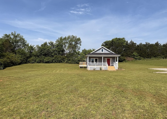 7022 Magnolia Ln, Nunnelly, TN 37137 - view of green lawn with a porch