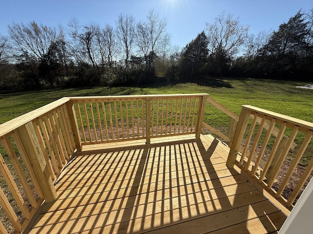 7022 Magnolia Ln, Nunnelly, TN 37137 - deck with a yard and view of wooded area
