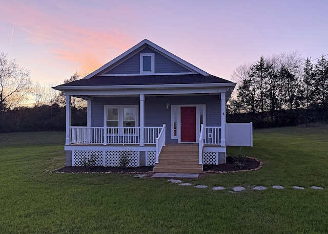 7022 Magnolia Ln, Nunnelly, TN 37137 - view of front of home with covered porch, a lawn, and roof with shingles