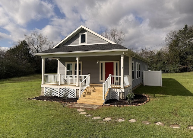 7022 Magnolia Ln, Nunnelly, TN 37137 - view of front of property with covered porch, roof with shingles, and a front yard