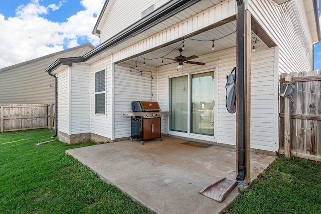 view of patio / terrace featuring grilling area, fence, and ceiling fan