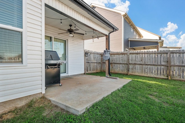 view of patio / terrace featuring fence, grilling area, and a ceiling fan