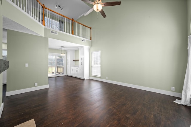 1829 Apple Valley Cir, Nashville, TN 37207 - unfurnished living room featuring visible vents, baseboards, a towering ceiling, a ceiling fan, and dark wood-style floors