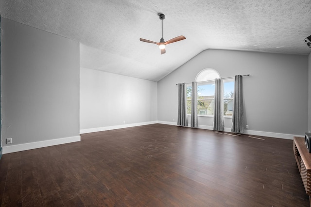1829 Apple Valley Cir, Nashville, TN 37207 - unfurnished living room featuring a textured ceiling, baseboards, ceiling fan, wood finished floors, and lofted ceiling