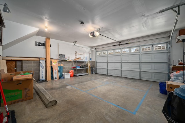 1829 Apple Valley Cir, Nashville, TN 37207 - garage with concrete block wall and a garage door opener