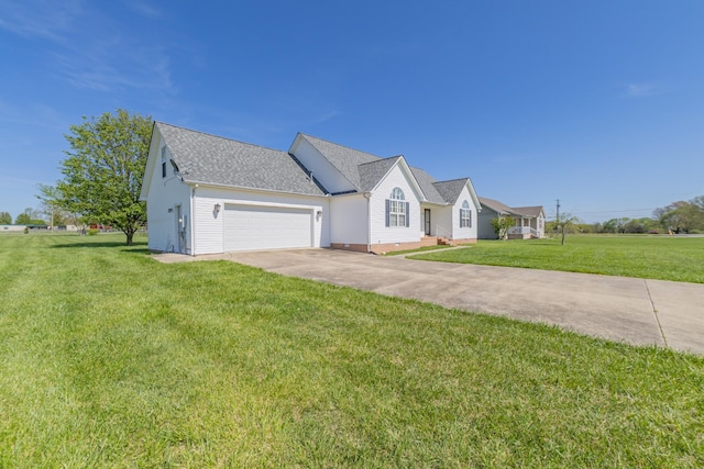 view of front facade featuring roof with shingles, a garage, concrete driveway, and a front lawn