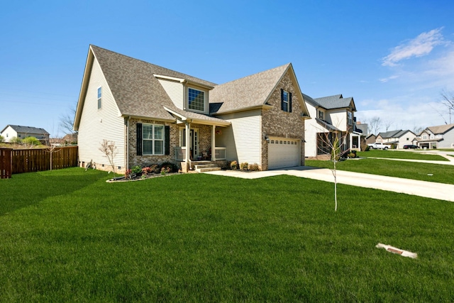 view of front of property featuring crawl space, concrete driveway, an attached garage, fence, and a front yard