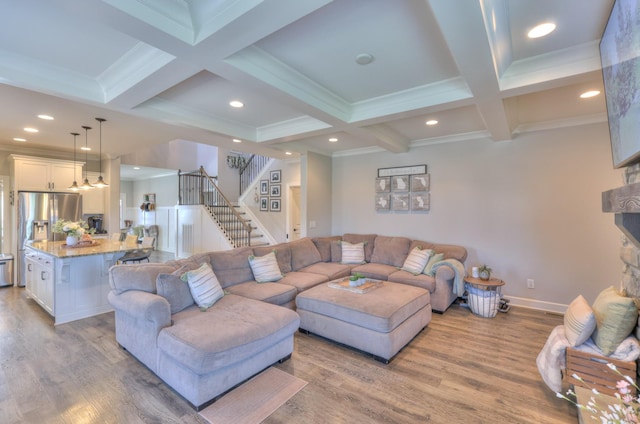 127 Waters Hill Cir, Lebanon, TN 37087 - living room with stairs, beam ceiling, light wood finished floors, a fireplace, and baseboards