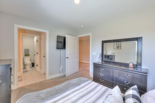 127 Waters Hill Cir, Lebanon, TN 37087 - bedroom featuring baseboards, carpet floors, ensuite bathroom, and tile patterned flooring