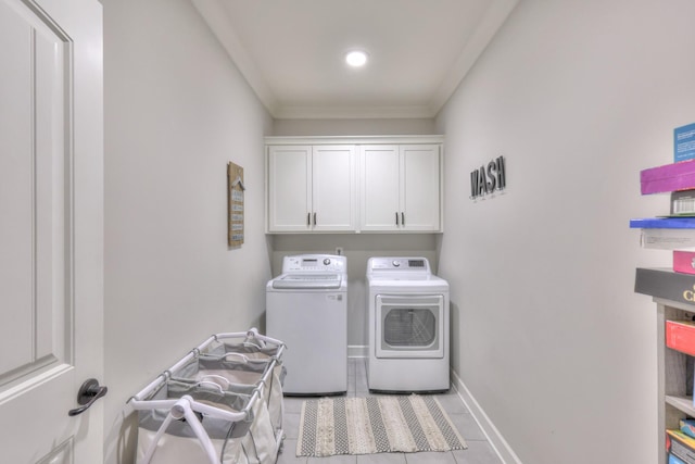 127 Waters Hill Cir, Lebanon, TN 37087 - laundry area featuring crown molding, independent washer and dryer, light tile patterned floors, baseboards, and cabinet space