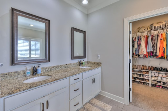 127 Waters Hill Cir, Lebanon, TN 37087 - full bathroom featuring a sink, a walk in closet, tile patterned flooring, baseboards, and double vanity