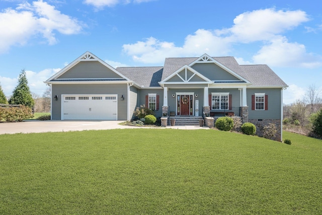 craftsman inspired home featuring a front lawn, driveway, a shingled roof, and a garage