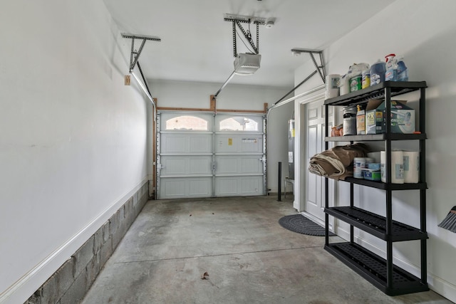 garage featuring a garage door opener
