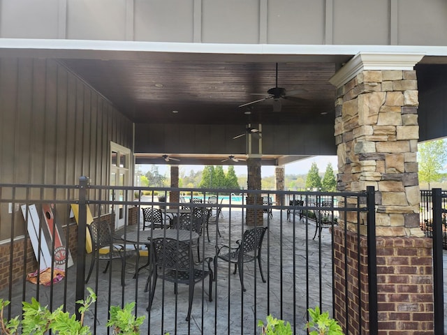 view of patio featuring outdoor dining space and ceiling fan