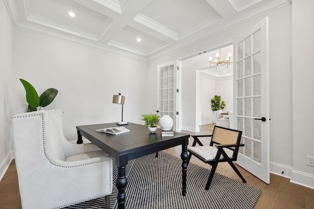 office area featuring coffered ceiling, crown molding, beam ceiling, french doors, and wood finished floors