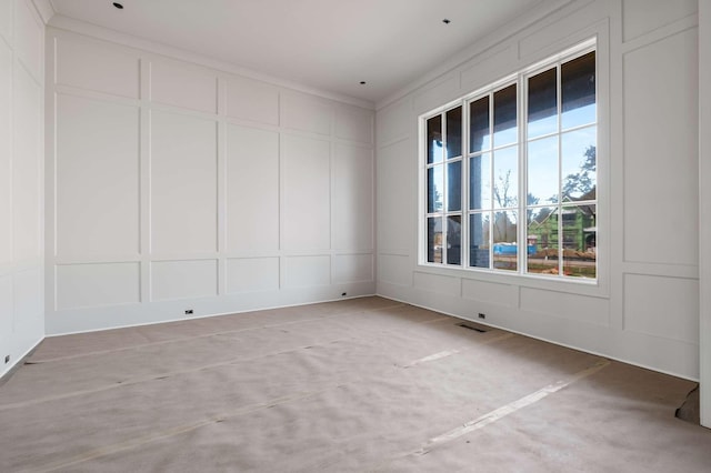 8115 Devens Dr, Brentwood, TN 37027 - empty room with a decorative wall, crown molding, and visible vents