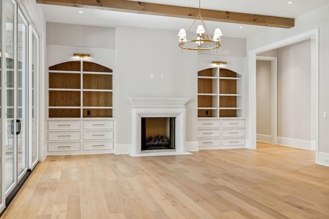 8115 Devens Dr, Brentwood, TN 37027 - unfurnished living room featuring a chandelier, light wood-style flooring, beam ceiling, and a fireplace