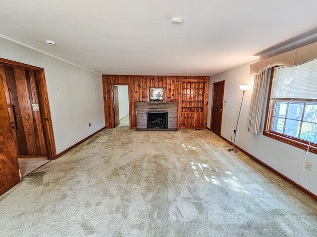 101 Church St, Wartrace, TN 37183 - unfurnished living room featuring light carpet, a fireplace, baseboards, and ornamental molding
