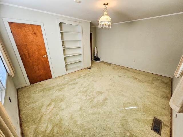 101 Church St, Wartrace, TN 37183 - spare room with crown molding, carpet flooring, and visible vents