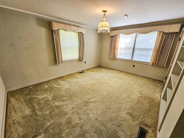 101 Church St, Wartrace, TN 37183 - empty room with a chandelier, visible vents, ornamental molding, and carpet floors