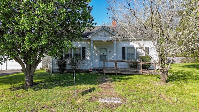 101 Church St, Wartrace, TN 37183 - view of front of property featuring a front yard and a chimney