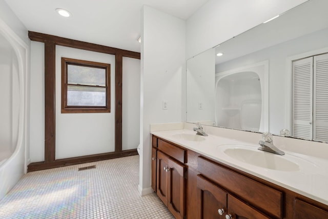 3755 Bear Hollow Rd, Joelton, TN 37080 - full bath with double vanity, recessed lighting, toilet, and a sink